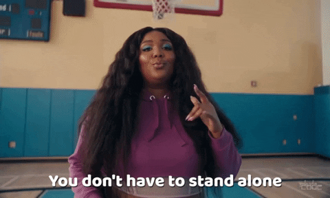 Singer Lizzo saying "You don't have to stand alone to take a stand!"