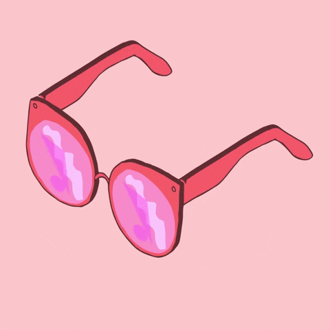 Rose colored glasses hovering on pink background